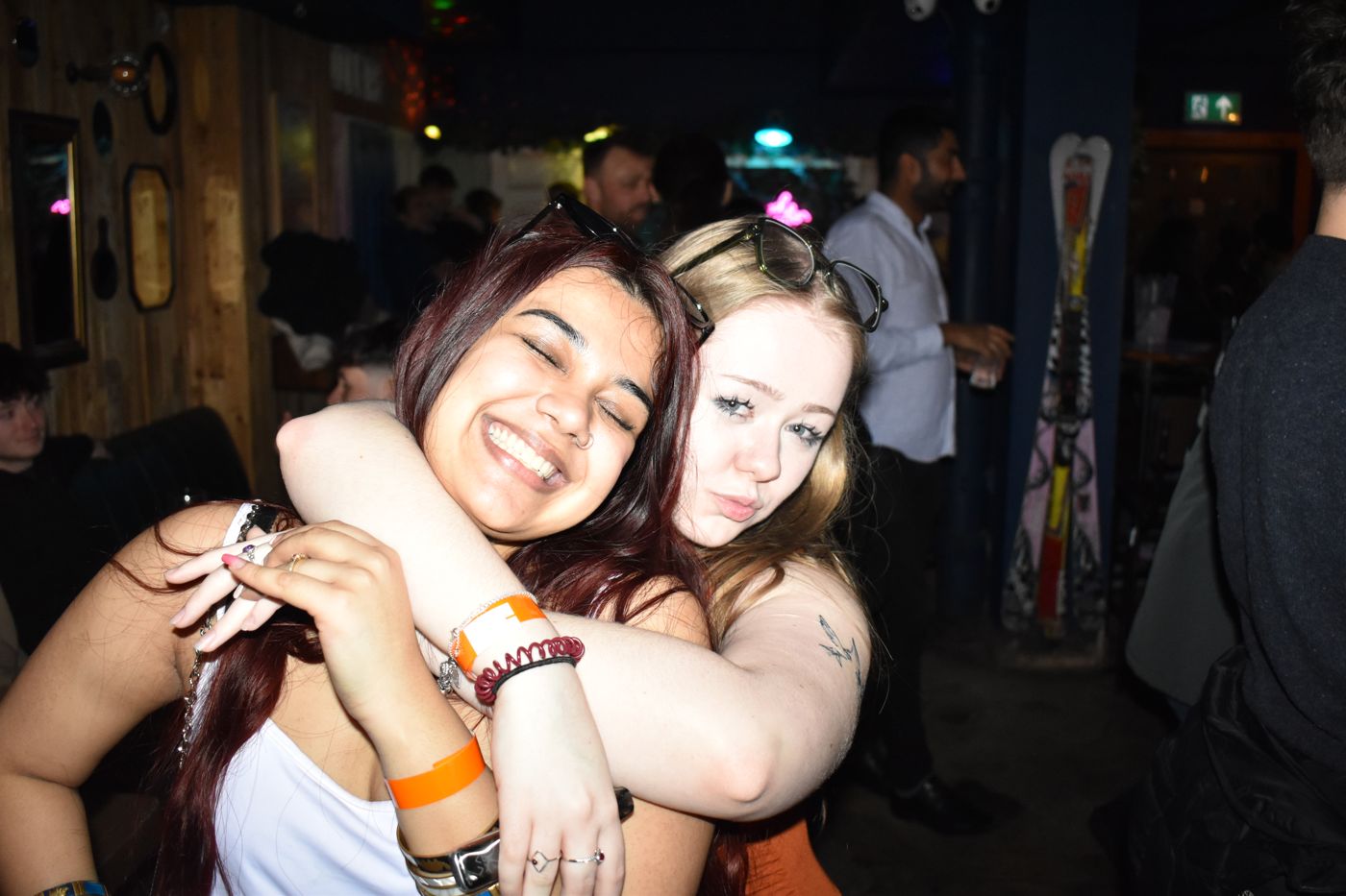 New friends mid-hug
