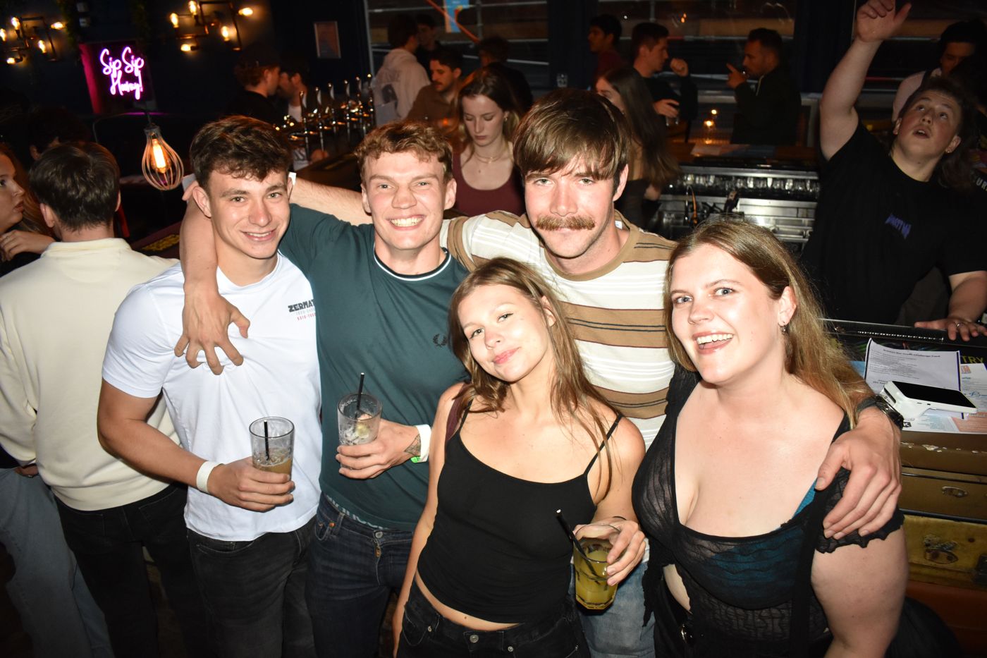 Five-person crew with drinks