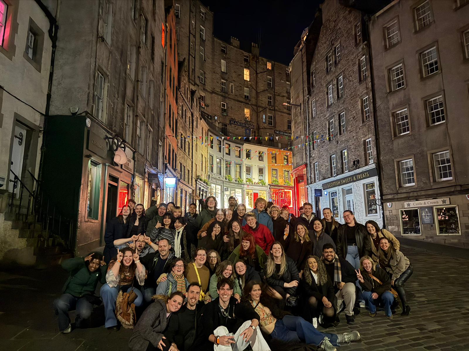 Bobby's Bar Crawl group in Edinburgh Old Town at night